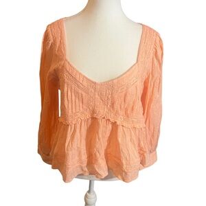 American eagle baby doll shirt with a sweetheartrt neckline and ruffles coral M